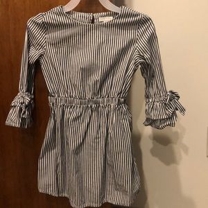 Striped dress with bow detail on 3 quarter sleeves